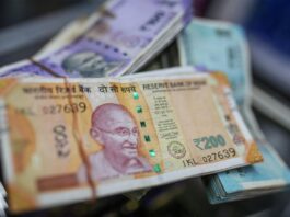 Rupee falls 14 paise to close at 82.35 against US dollar