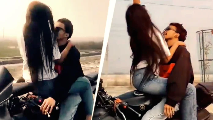 Kanpur Couple Romancing On Bike Sparks Viral Video And Police Action